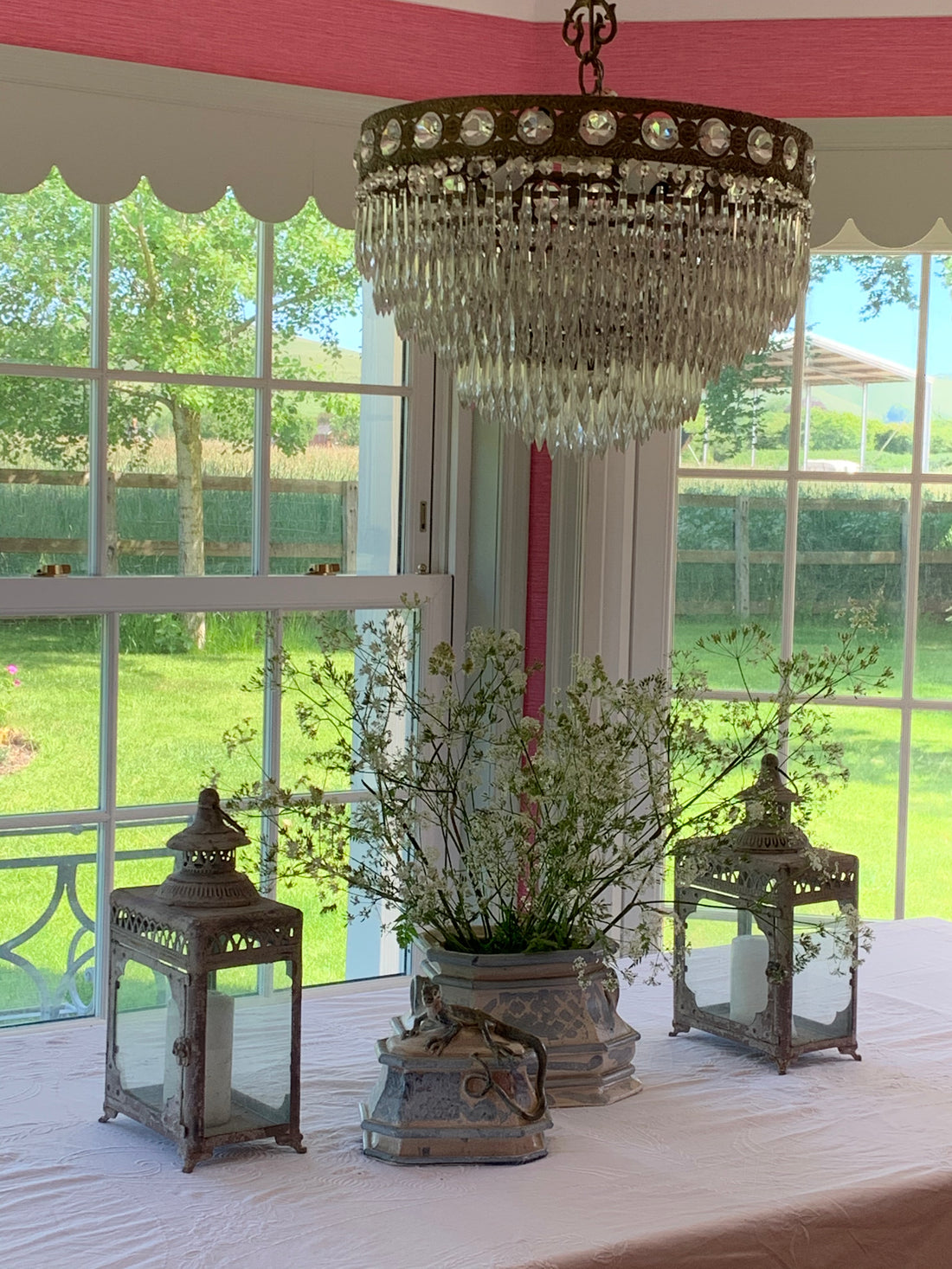Larger mdf scalloped edging as a curtain pelmet in the windows of this stunning dining room. versatile and impactful interior design.