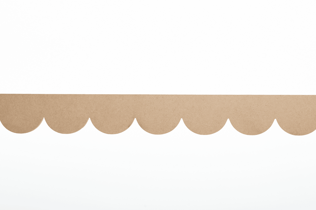 Elegant scallop architrave detailing on the Coco design, featuring scallop edging and moulding. Perfectly crafted MDF moulding edges add a sophisticated touch to any interior.
