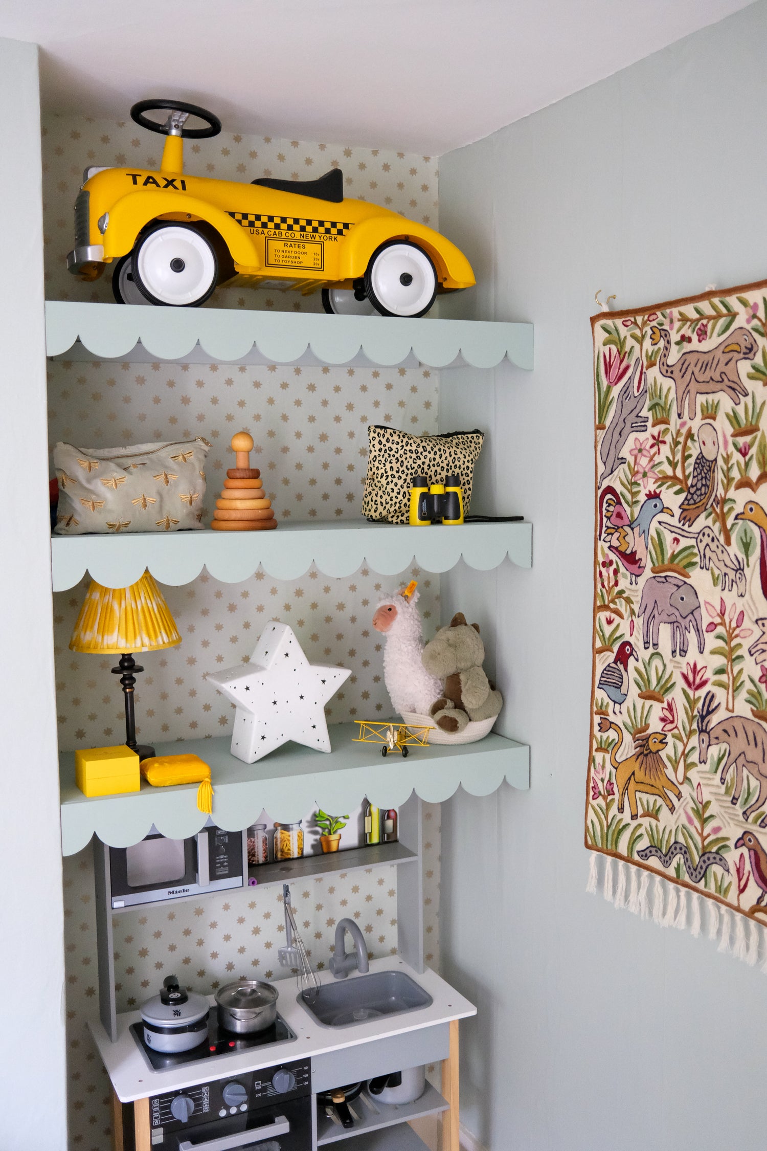 wooden scalloped edging create these beautiful painted scalloped shelves in this stunning childrens bedroom designed by Katherine Ormorod. molding used perfectly