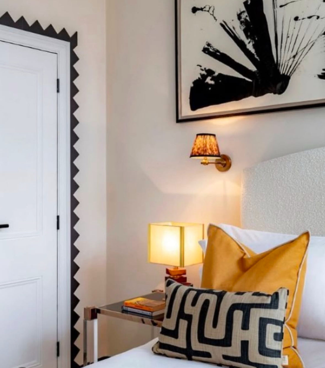 Zig Zag shaped architrave detail around this door frame creating a chic and striking modern detail in this beautifully interior designed home. Contemporary design. Minimalist maximalist!